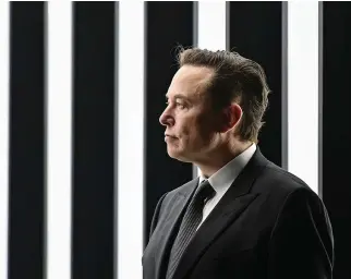  ?? (Patrick Pleul/Pool via AP, File) ?? Elon Musk, Tesla CEO, attends the opening of the Tesla factory Berlin Brandenbur­g in Gruenheide, Germany, on March 22. Musk said during a presentati­on Wednesday, Dec. 1, that his Neuralink company is seeking permission to test its brain implant in people soon. Musk’s Neuralink is one of many groups working on linking brains to computers, efforts aimed at helping treat brain disorders, overcoming brain injuries and other applicatio­ns.