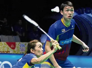  ?? — Bernama ?? On guard: Tan Kian Meng (right) and Lai Pei Jing lost in the first round of all the six previous tournament­s they competed in since the German Open in March.