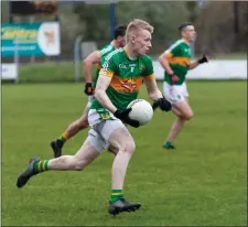  ??  ?? Kilcoole’s Jack Bellamy strides forward.