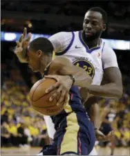  ?? MARCIO JOSE SANCHEZ — THE ASSOCIATED PRESS FILE ?? The Golden State Warriors’ Draymond Green defends against New Orleans Pelicans guard Rajon Rondo during the first half in Game 1 of an NBA basketball second-round playoff series in Oakland, Calif. Rondo and Green both have won NBA titles and neither...