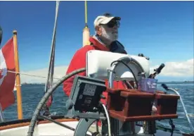  ?? KAREN SCHWARTZ ?? Jerry Schwartz sails through the Strait of Georgia.