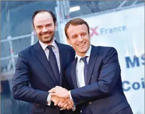  ?? KCNA VIA KNS/AFP ?? Edouard Philippe (left) has been chosen by French President Emmanuel Macron to be the new prime minister.