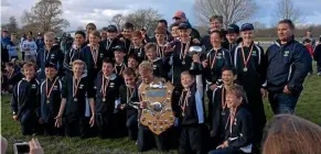  ??  ?? The winning Cambridge Gwynne Shield team celebrate on Saturday.