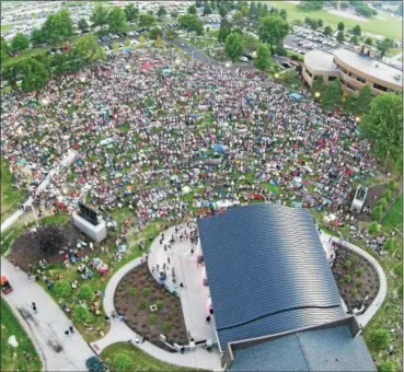  ?? SUBMITTED ?? This drone shot from the city of Mentor captures the crowd attending the most recent concert in the Mentor Rocks series. The series is being extended this year because of the huge response to the new venue.