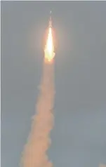  ?? PTI ?? People look on as GSLV-F08 carrying GSAT-6A communicat­ion satellite blasts off into the orbit from Satish Dhawan Space Centre in Sriharikot­a on Thursday. —