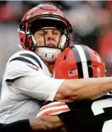  ?? SUE OGROCKI/ASSOCIATED PRESS ?? Joe Burrow, who missed most of the preseason, threw for a careerlow 82 yards Sunday in Cleveland.