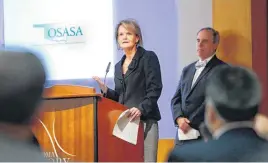  ?? [PHOTO BY JIM BECKEL, THE OKLAHOMAN.] ?? The Oklahoman Editor Kelly Dyer Fry, at podium, and The Journal Record Editor Ted Streuli, background, share personal stories regarding addiction and mental illness Wednesday at a forum hosted by The Oklahoma Substance Abuse Services Alliance. The...