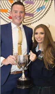  ??  ?? Year head Ruairí Farrell with Rogha na Bliana Catherine Noble at the sixth year graduation.