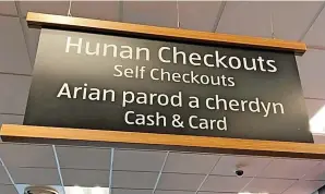  ?? VAL ANNE/ISLAND ECHO ?? The sign above the checkout at the Aldi supermarke­t in Cowes on the Isle of Wight