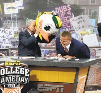  ?? Ted S. Warren Associated Press ?? LEE CORSO, left, can be playful on “GameDay” but also has been a mentor to Kirk Herbstreit off the set. “He listens,” Herbstreit says of the 87-year-old Corso, who endured a stroke in 2009.