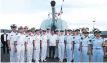  ??  ?? Duterte greets the Chinese navy sailors on missile destroyer Changchun in Davao City on May 1, 2017. The Chinese naval fleet paid a three- day visit to the Philippine­s from April 30 to May 2, 2017.
