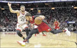  ?? ALAN DIAZ / ASSOCIATED PRESS ?? Tyler Johnson (right) has been among injured Heat players and has missed nine games, but he says “we never made an excuse, we continued to fight.”