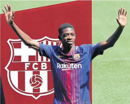  ??  ?? Barcelona’s Ousmane Dembele during the official presentati­on at the Nou Camp this week.