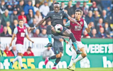  ??  ?? Sadio Mane (C) has been quite influentia­l for Liverpool this season, having scored four goals so far.
GETTY IMAGES