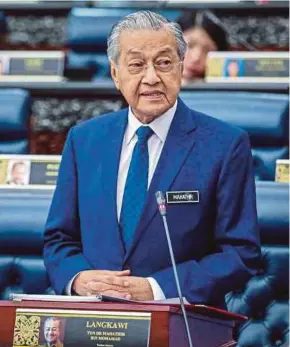  ?? FILE PIC ?? Prime Minister Tun Dr Mahathir Mohamad presented the mid-term review of the 11MP in Parliament on Oct 18. He had confirmed the setting up of a centralise­d research management agency.