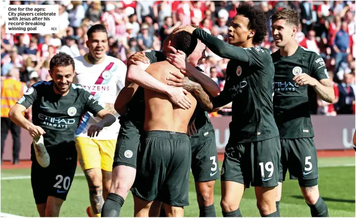  ?? REX ?? One for the ages: City players celebrate with Jesus after his record-breaking winning goal