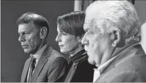  ?? CP PHOTO ?? CLC President Hassan Yussuff, left, PIPSC President Debi Daviau and PSAC President Chris Aylward listen during a news conference about pay equity in Ottawa Wednesday.