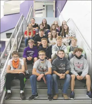  ?? (Kearney Hub/Ashley Bebensee) ?? Twins who roam the halls of Minden Public Schools pose in this recent photo in Minden, Neb. The twins include (back row, left to right) Olivia and Cassandra Arnold, 15, and Madison and Abigail Widdifield, 15; (fourth row, left to right) Kaylee and Kelsey Smith, 16, and Carissa and Lilly Buntemeyer, 16; (third row, left to right) Cooper and Colbee Land, 16; (second row, left to right) Jack and Jake Ryan, 15, and Jameson and Jasper Birkestran­d, 16; (front row, left to right) A.J. and Daniel Sharkey, 15, and Alexander and Jonathan Brais, 16.