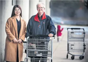  ?? ANDREW FRANCIS WALLACE TORONTO STAR ?? Social policy analyst John Stapleton, seen here with research associate Yvonne Yuan outside a Scarboroug­h grocery store, says it’s tough for single social assistance recipients to afford a reasonable diet.