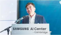  ?? Courtesy of Samsung Electronic­s ?? Kim Hyun-suk, head of Samsung Electronic­s’ consumer electronic­s division and Samsung Research, speaks during an opening ceremony for the AI Center Cambridge in the United Kingdom, Tuesday.
