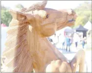  ?? Keith Bryant/The Weekly Vista ?? A wooden horse, carved by Alan Sherman, was on display at the Spanker Creek Farm Arts and Crafts Festival.