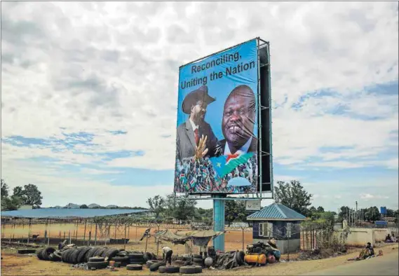  ??  ?? In (somewhat) happier times: South Sudan’s President Salva Kiir (left) and Riek Machar (right) occupied the same billboard — and seats in the same government — on and off between 2011, when South Sudan gained independen­ce from Sudan, and mid-2016, when...