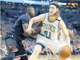  ?? MICHAEL DWYER/AP ?? Pat Riley said getting Kelly Olynyk (41) filled a greater need to get support for Hassan Whiteside and first-round pick Bam Adebayo.