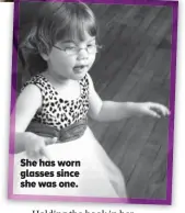  ??  ?? She has worn glasses since she was one.