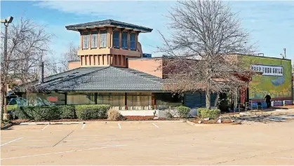  ?? [PHOTO BY CHRIS LANDSBERGE­R, THE OKLAHOMAN] ?? This building at 5418 N Western Ave. in Oklahoma City was sold recently by owner Chesapeake Energy.