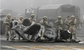  ?? Photograph: Mariya Gordeyeva/Reuters ?? Troops in Almaty’s main square; the president had ordered security forces to ‘shoot to kill’.