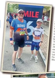  ?? ?? Billy Newby and his son Rearden have made the Peachtree a father/son tradition. This year was Rearden’s 7th Peachtree and Billy’s 34th. They even ran the race virtually last year all the way in Michigan.