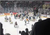  ?? JULIE JOCSAK TORSTAR FILE PHOTO ?? The Niagara IceDogs during their annual Teddy Bear Toss for victim services last December. On Tuesday, it was announced the team has been sold to a Brantford businessma­n.