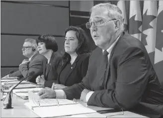  ?? CP PHOTO ?? Public Safety and Emergency Preparedne­ss Minister Ralph Goodale (left to right), Minister of Health Ginette Petitpas Taylor and Minister of Justice and Attorney General of Canada Jody Wilson-Raybould listen as Minister of Border Security and Organized Crime Reduction Bill Blair speaks during a news conference on legalized cannabis in Ottawa, Wednesday.