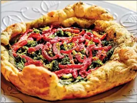  ?? Pittsburgh Post-Gazette/TNS/ANDREW RUSH ?? Broccoli, Red Pepper and Pesto Galette