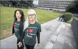  ??  ?? RESIDENTS Anne Kim, left, and Annette van Duren helped lead the effort to prevent developmen­t on the park, one of few green spaces in the neighborho­od.