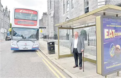  ?? Photograph by Darrell Benns ?? ON BOARD: Bill Comrie was reassured by the changes made on First’s fleet of buses.