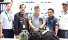  ?? GENERAL DEPARTMENT OF IMMIGRATIO­N ?? A man was arrested for drug traffickin­g by immigratio­n police based at Siem Reap Internatio­nal Airport.
