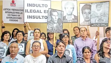 ??  ?? Relatives of the victims of Fujimori’s regime and their lawyers attend a press conference in Lima. — AFP photo