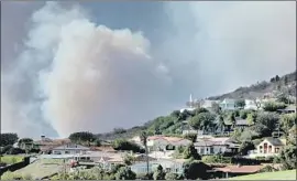  ?? Genaro Molina Los Angeles Times ?? SMOKE RISES from the Woolsey blaze in Malibu last month. About 1 in 10 buildings in California lie within the highest-risk fire zones in maps drawn by Cal Fire.