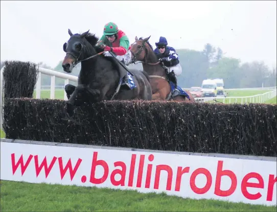  ??  ?? Imperial Joey jumps in Ballinrobe to win ahead of Cheap as Chips.
