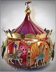  ?? COURTESY OF ISA BAURMEISTE­R ?? Los Gatos artist Lisa Baurmeiste­r creates intricate, fine art pieces like this carousel out of dried gourds. Baurmeiste­r is among hundreds of Bay Area artists participat­ing in Silicon Valley Open Studios the first three weekends in May.
