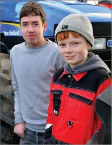  ??  ?? Billy Casey and Jamie Lynch at the start of the West Kerry Charity Tractor Run in Lios Póil on Sunday.