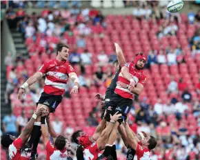  ?? BACKPAGEPI­X ?? AIR FORCE: Franco Mostert and Warren Whiteley of the Lions against the Sharks at Ellis Park Stadium last week.