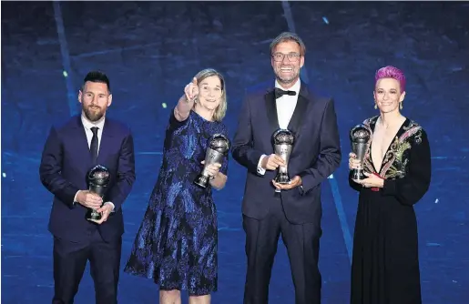  ?? REUTERS ?? Fourmidabl­e . . . Fifa award winners (from left) Barcelona forward Lionel Messi (best men’s player), United States women’s coach Jill Ellis (best female coach), Liverpool manager Juergen Klopp (best male coach) and United States winger Megan Rapinoe (best women’s player) at the prizegivin­g in Milan yesterday.