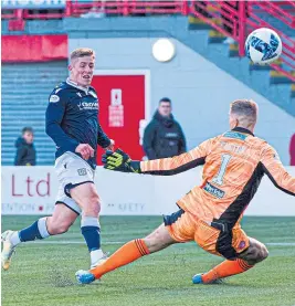  ?? ?? Luke McCowan’s late goal wraps up the win for Dundee