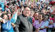  ?? PHOTO: REUTERS ?? North Korean leader Kim Jong Un meets supporters in this photo released by North Korea’s Korean Central News Agency.