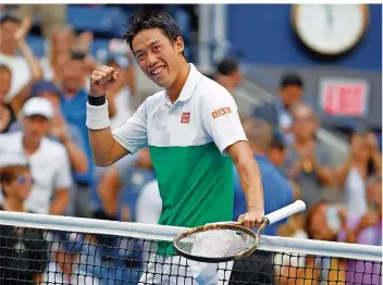  ?? FOTO: HUNGER/DPA ?? Geballte Faust: Japans Volksheld Kei Nishikori besiegte im Viertelfin­ale der US Open den Kroaten Marin Cilic. Zuvor erreichte seine Landsfrau Naomi Osaka das Halbfinale beim letzten Grand-Slam-Turnier des Jahres.