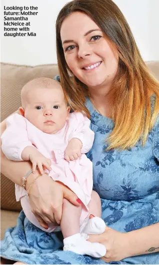  ??  ?? Looking to the future: Mother Samantha McNeice at home with daughter Mia