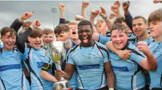  ??  ?? Galwegians’ captain Edward Shekete celebrates with his U-16 Cup victory and Buccaneers’ Mark Tallon (below) after the U-18.5 Cup final