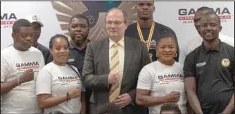  ?? ?? Karl Hala, Group General Manager of Continenta­l Hotel Group with victorious MMA team to the 13th African Games at a reception organised by Lagos Continenta­l Hotel…recently